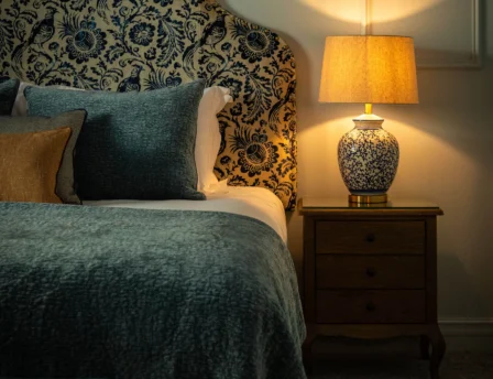 Cosy hotel room with elegant decor and soft lighting at Fernhill House Hotel.