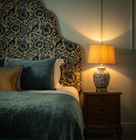 Cosy hotel room with elegant decor and soft lighting at Fernhill House Hotel.