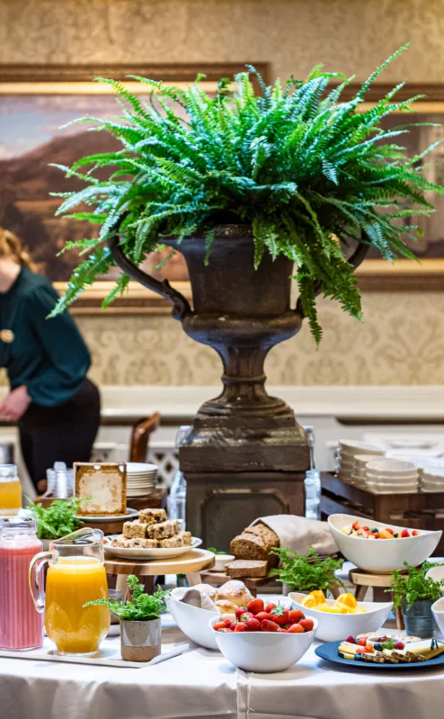 Elegant breakfast buffet with fresh fruits and pastries at Fernhill House Hotel.