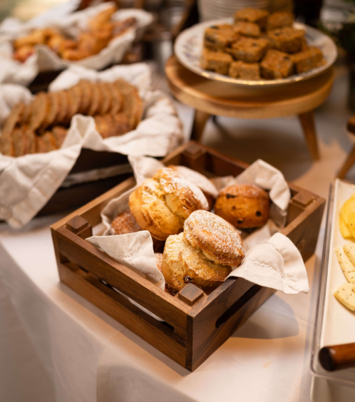 Fresh scones and baked goods at Fernhill House Hotel breakfast spread.