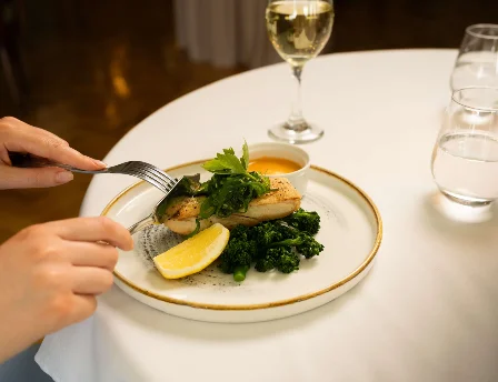 Elegant dining experience with delicious gourmet dish at Fernhill House Hotel.